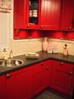 Najlepše ideje za enterijer: kako da upotrebite crvenu boju u kuhinji